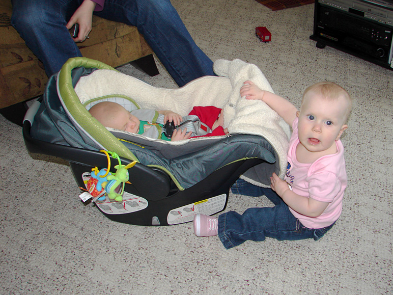 Katelyn checking on my cousin's new baby, Xander (262.29 KB)